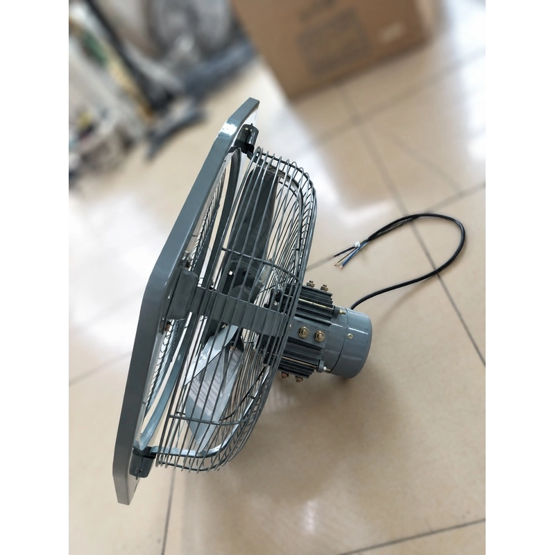 Side view of heavy duty wall exhaust fan showing wire guard depth, motor and cable