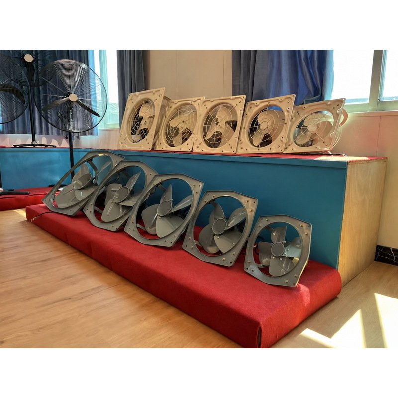 Multiple sizes of commercial wall mounted exhaust fans displayed together